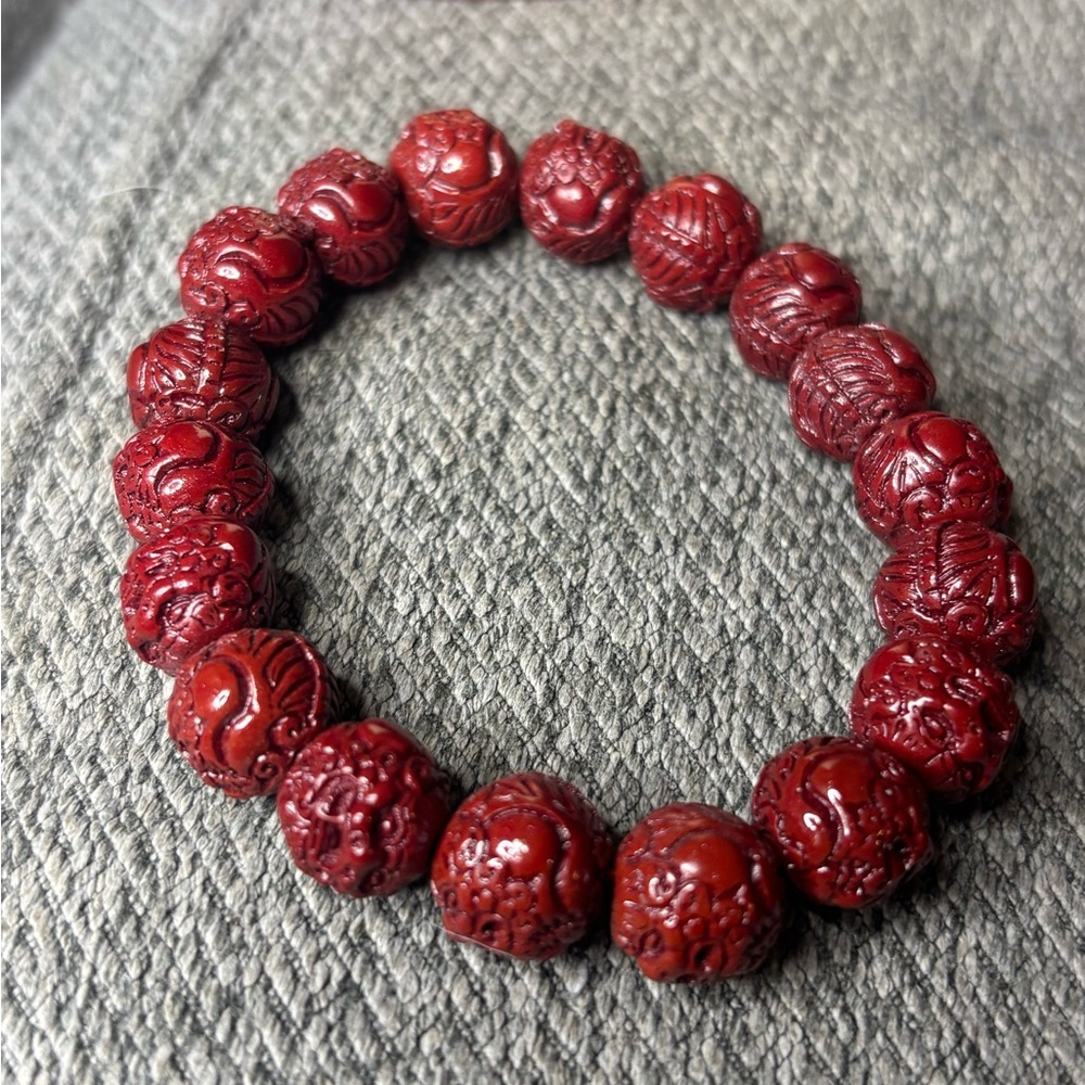 Cinnabar Carved Lions Beaded Bracelet